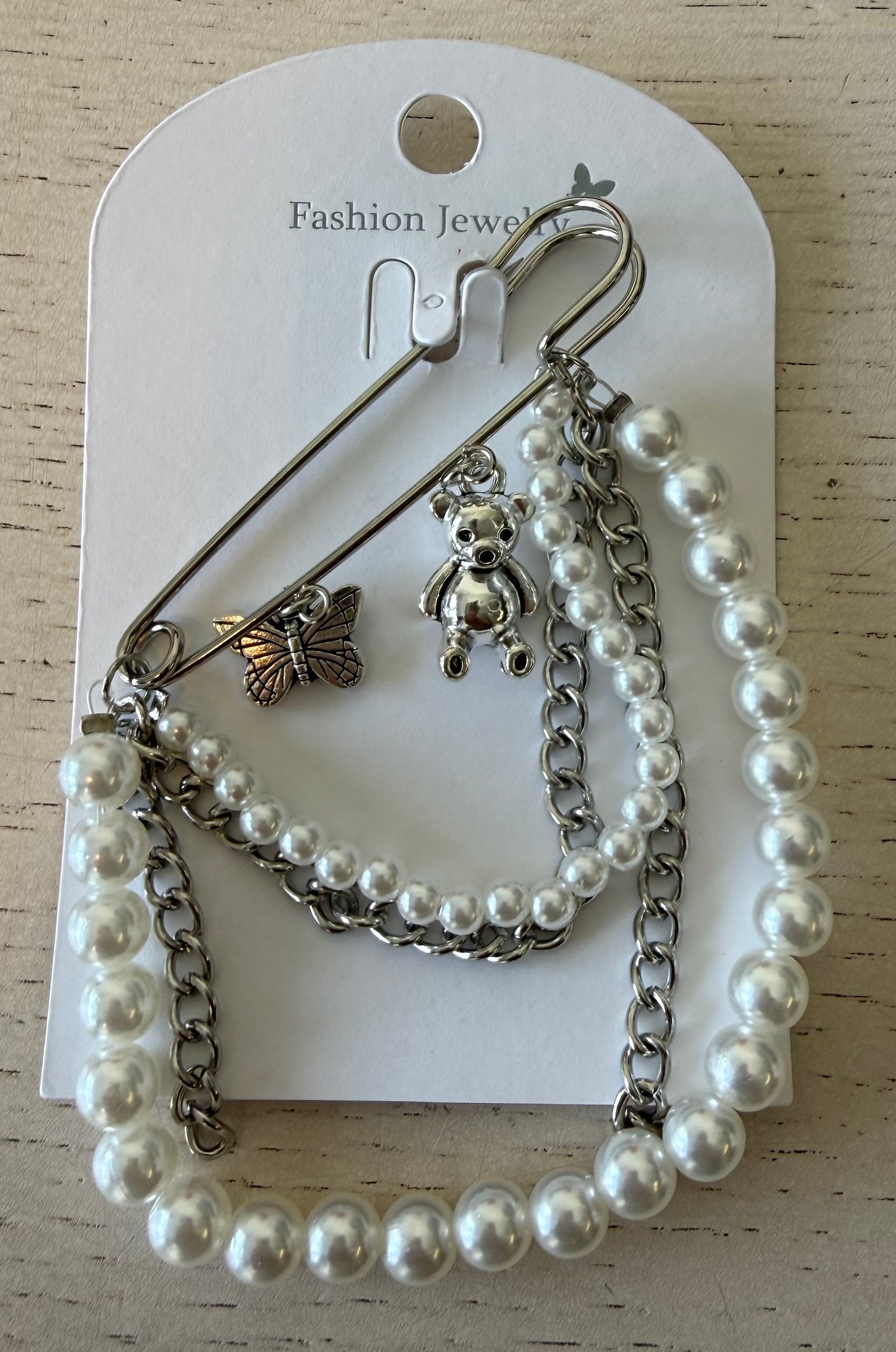 Broche met bedeltjes (3)