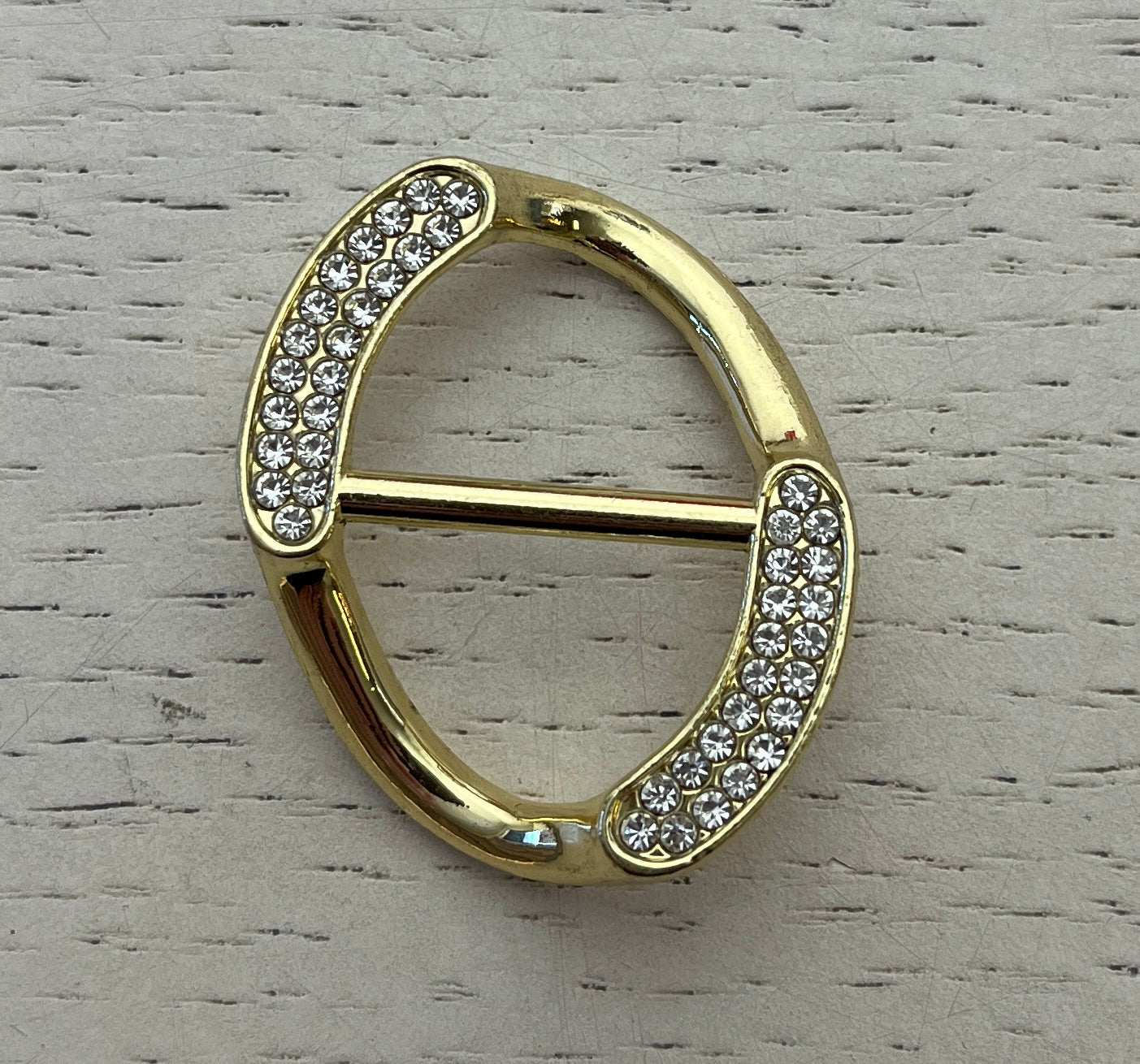 Kleding ophaler ovaal met strass steentjes goud of zilver