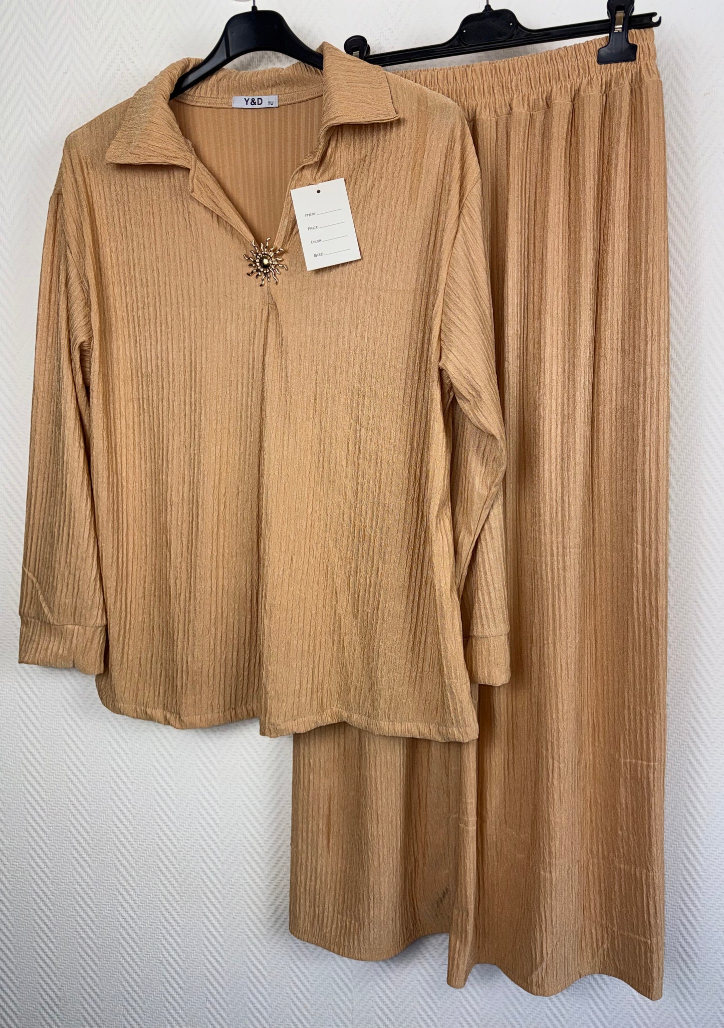 Plissé pak met broche maat 40/42/44/46/48