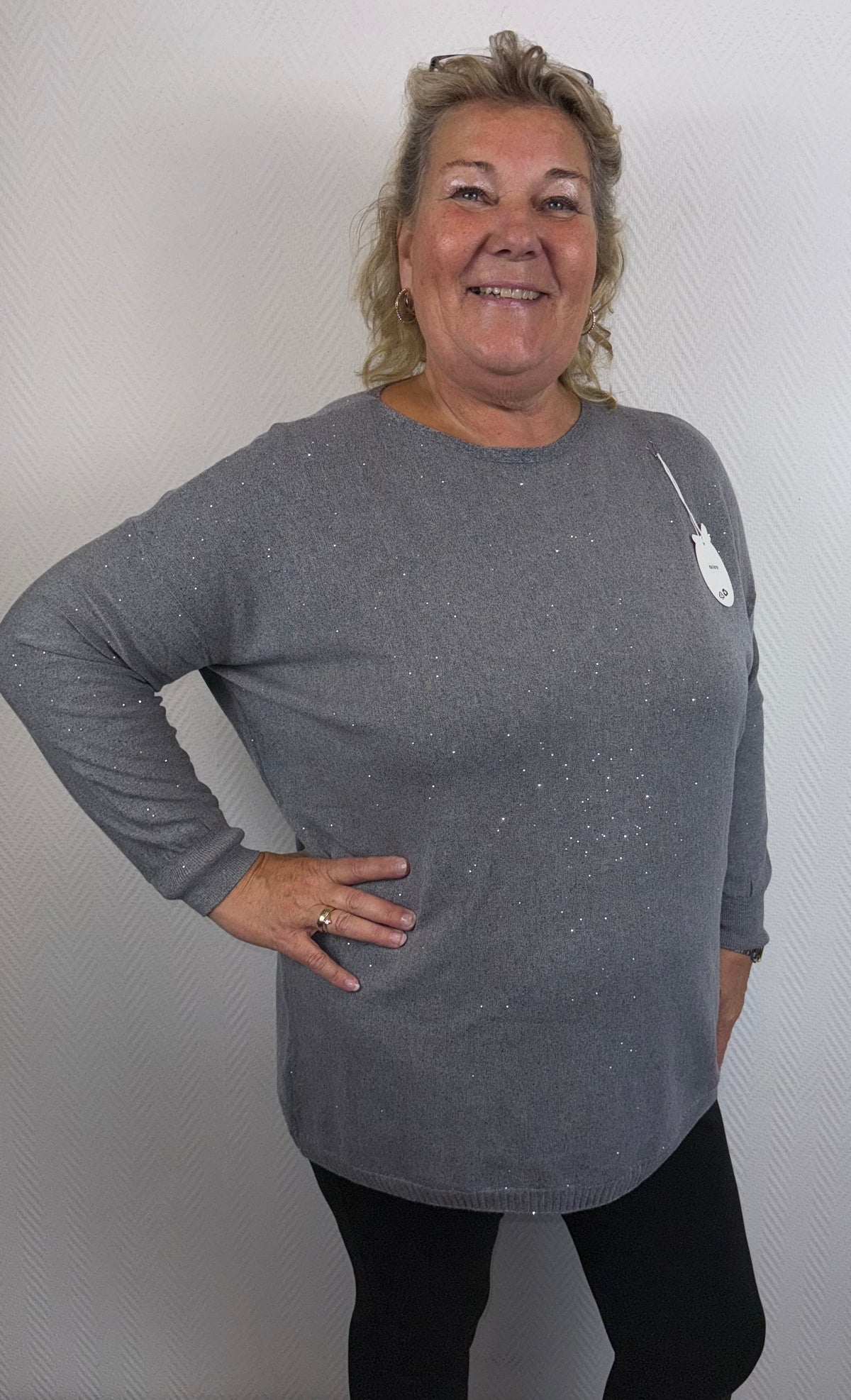 Glitter trui met knoopjes op de rug 46/48/50