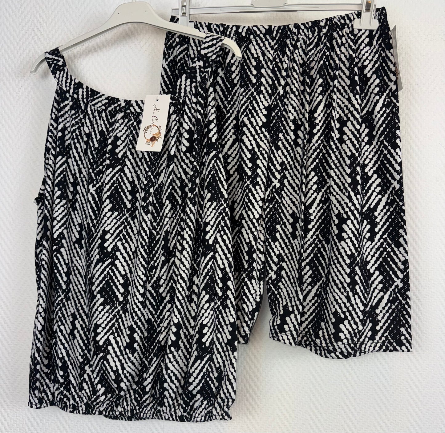 Korte travels setjes zwart/wit (2) 42/44/46/48