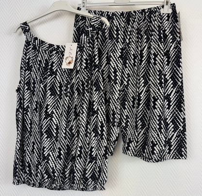 Korte travels setjes zwart/wit (2) 42/44/46/48