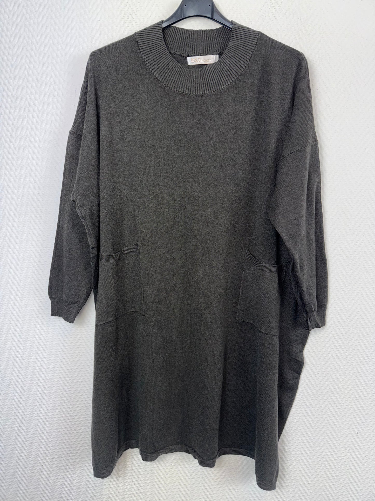 Lange trui met zakjes 50/52/54